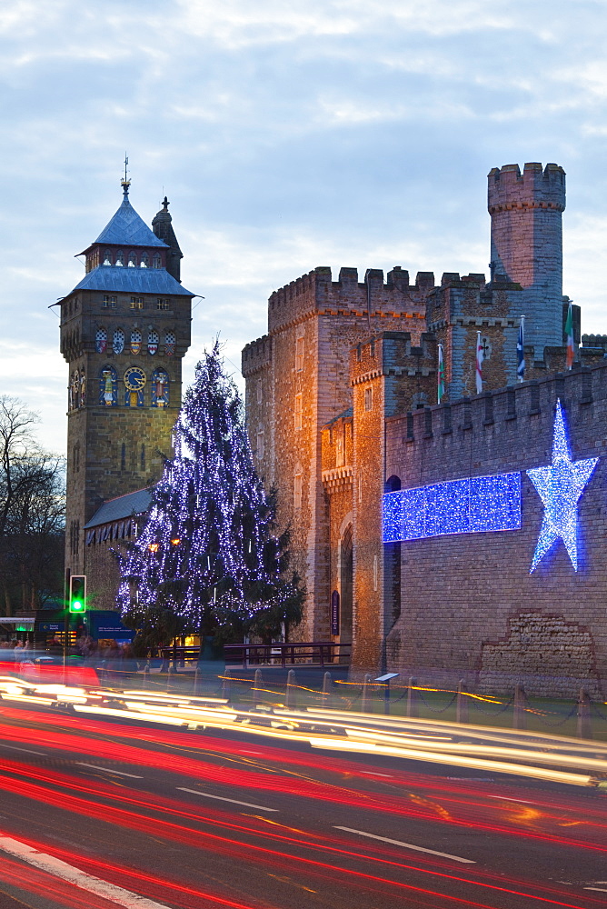 Cardiff Castle with Christmas lights and traffic light trails, Cardiff, South Wales, Wales, United Kingdom, Europe