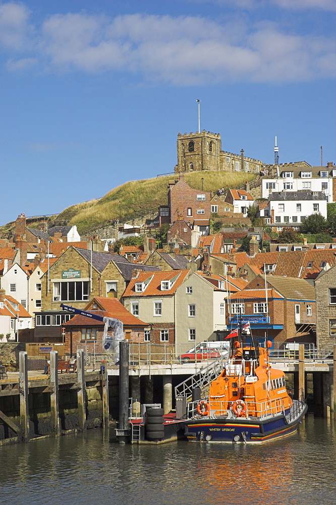 Church and lifeboat in the harbour, Whitby, North Yorkshire, Yorkshire, England, United Kingdom, Europe