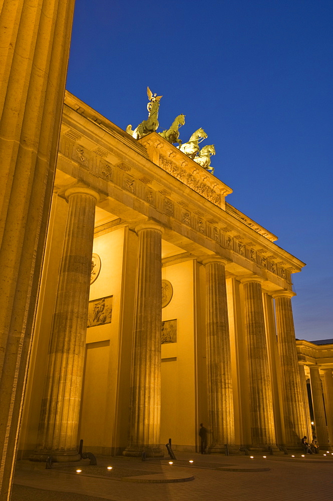 The Brandenburg Gate with the Quadriga winged victory statue on top illuminated at night, Pariser Platz, Berlin, Germany, Europe