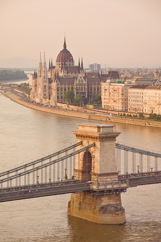 Panorama of city at sunset with neo-gothic Hungarian Parliament building, and the River Danube, UNESCO World Heritage Site, Budapest, Hungary, Europe