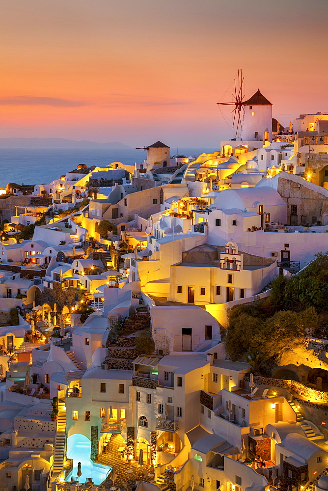 Windmill and traditional houses at sunset, Oia, Santorini (Thira), Cyclades Islands, Greek Islands, Greece, Europe