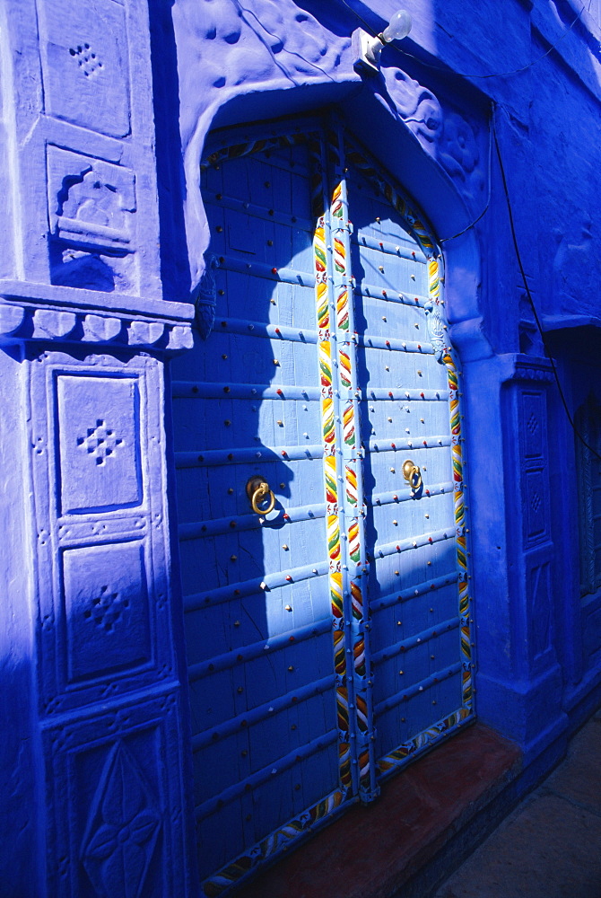 Elaborate blue door, The blue town of Jodhpur, Rajasthan, India, The blue houses are those belonging to the Brahmin caste