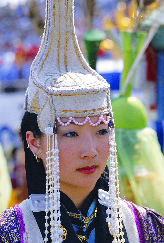 Portrait of a woman at the Naadam Festival, Ulaan Baatar (Ulan Bator), Mongolia, Asia