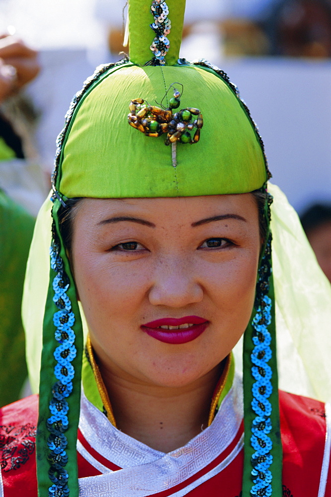 Portrait of a woman at the Naadam Festival, Ulaan Baatar (Ulan Bator), Mongolia, Asia