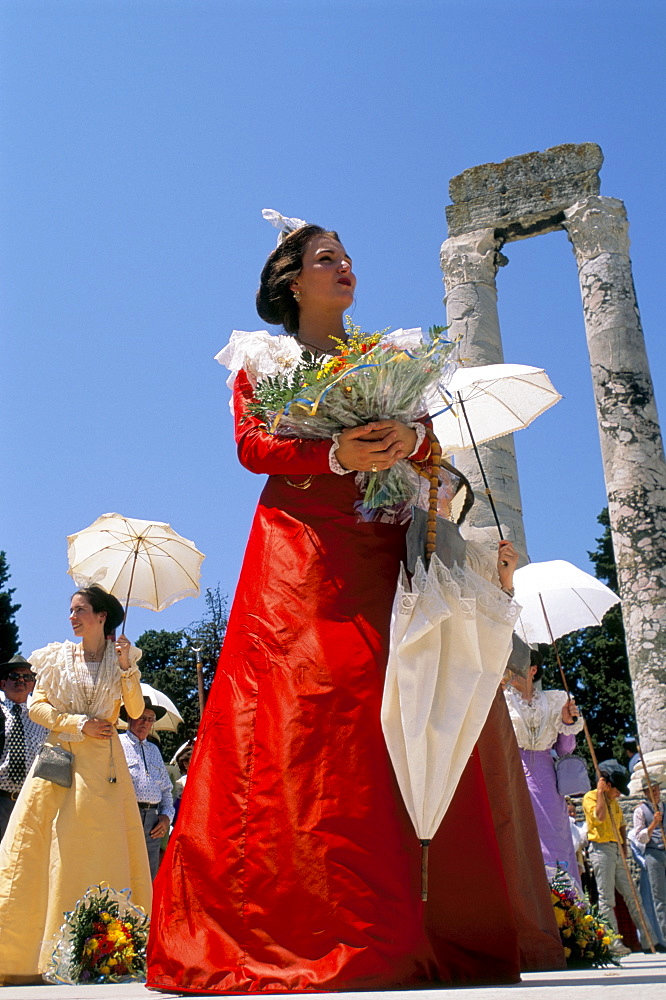 Woman in costume at festival, Arles, Bouches du Rhone, France, Europe