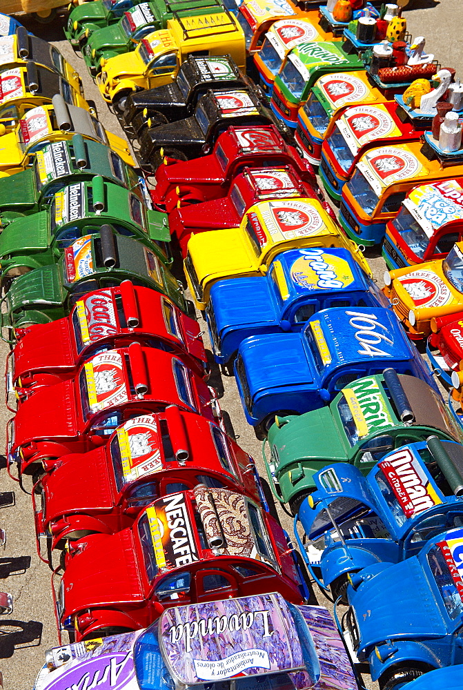 Toy cars made with metal food box and sold on the National 7 road, Madagascar, Africa