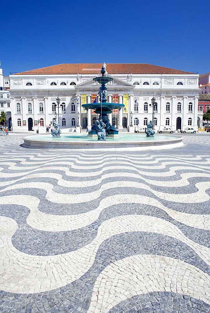 Mosaics and fountain with Lisbon Opera House in the background, Praca Dom Pedro IV (Rossio Square), Lisbon, Portugal, Europe