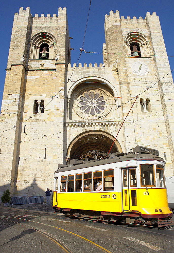 Eletrico (electric tram) in front of the Se Cathedral, Lisbon, Portugal, Europe