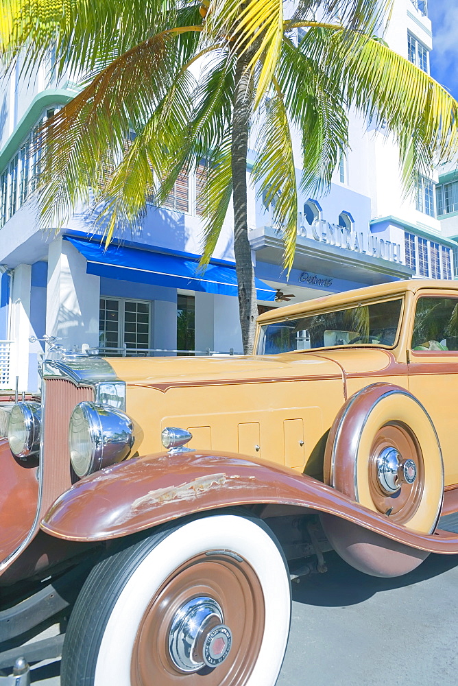 Vintage car by art deco building, Ocean Drive, Art Deco District, South Beach, Miami, Florida, United States of America, North America