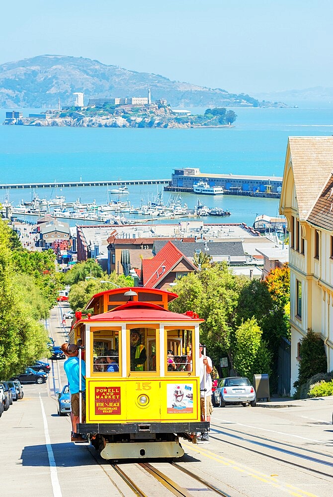 Powell-Hyde line cable car with Alcatraz Island in the background, San Francisco, California, United States of America, North America