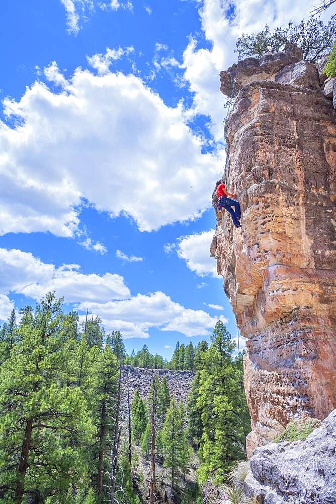 Man rock climbing at The Pit (Le Petit Verdon) in Sandy's Canyon, Flagstaff, Arizona, United States of America, North America