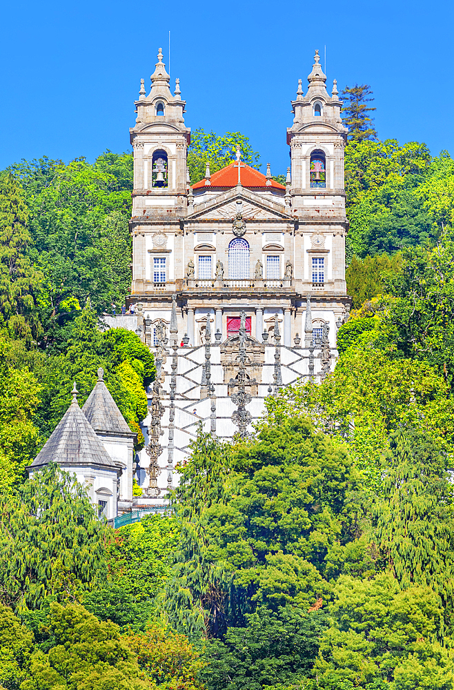 View of Bom Jesus do Monte santuary immersed in the greenery of the surrounding woods, Braga, Minho Province, Portugal