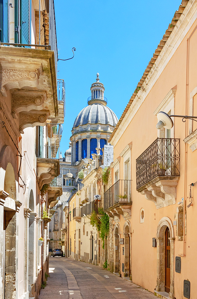 Narrow street leading to the Cathedral, Ragusa Ibla, Ragusa province, Sicily, Italy