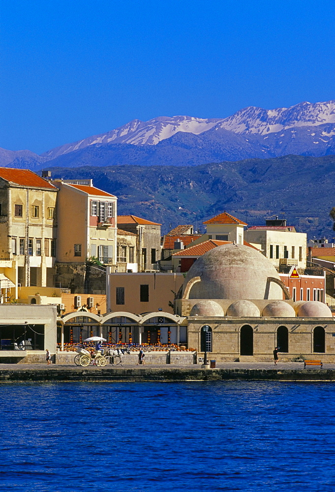 Hania (Chania) seafront and Levka Ori (White Mountains) in the background, Hania, island of Crete, Greece, Mediterranean, Europe