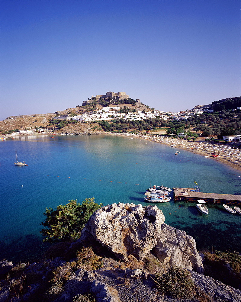 Lindos Bay and Lindos city in the background, Lindos, island of Rhodes, Dodecanese Islands, Aegean Sea, Greece, Europe