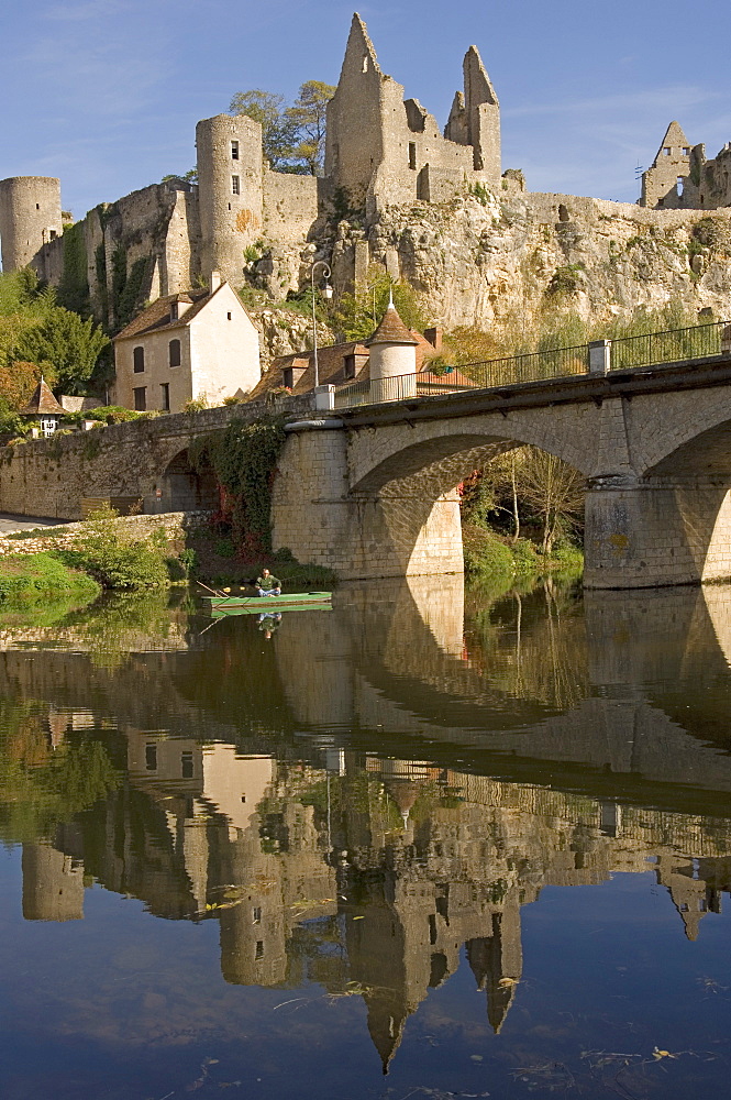 An angler on the Anglin river, with the medieval castle built between the 11th and 15th centuries behind, Angles sur l'Anglin, Vienne, Poitou-Charentes, France, Europe