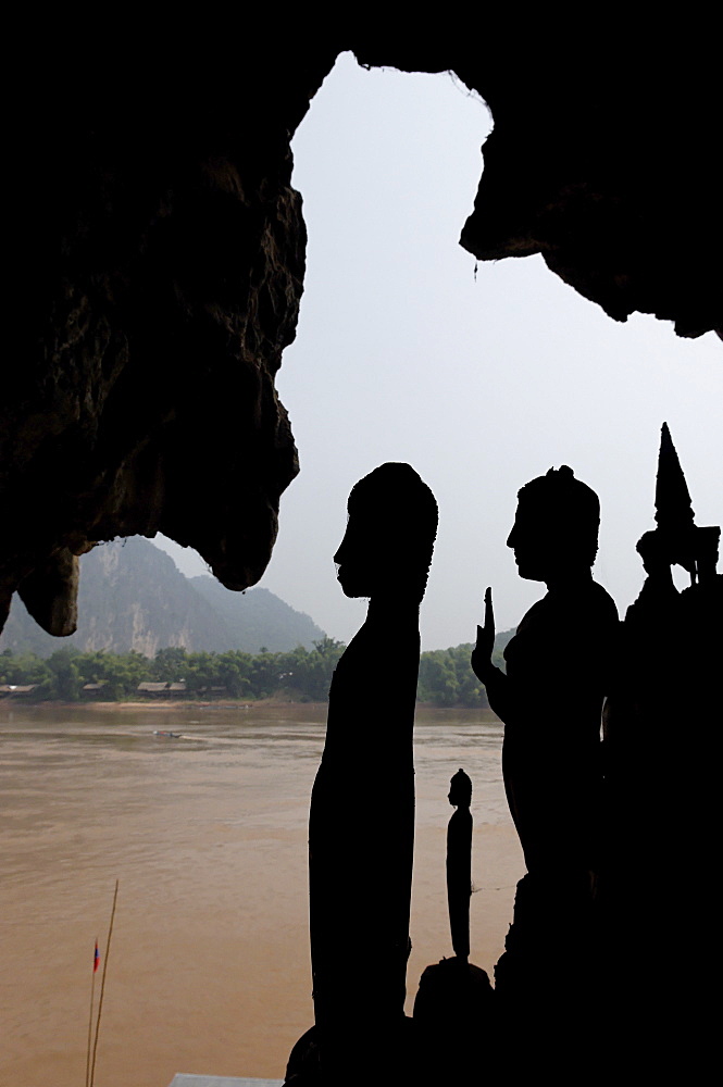 The Pak Ou caves, a well known Buddhist site and place of pilgrimage, 25km from Luang Prabang, Laos, Indochina, Southeast Asia, Asia