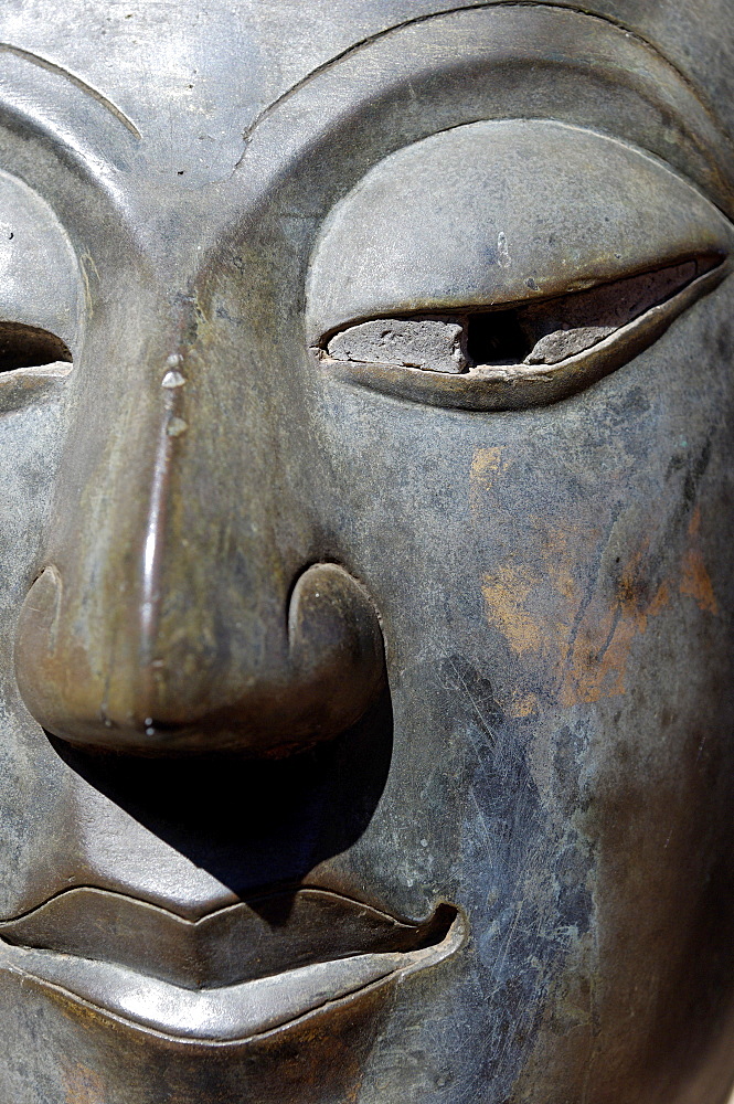 Detail of Buddha statue at Wat Phra Keo, original location of the Emerald Buddha, seized by the Thais in 1778 and taken to Bangkok, Vientiane, Laos, Indochina, Southeast Asia, Asia