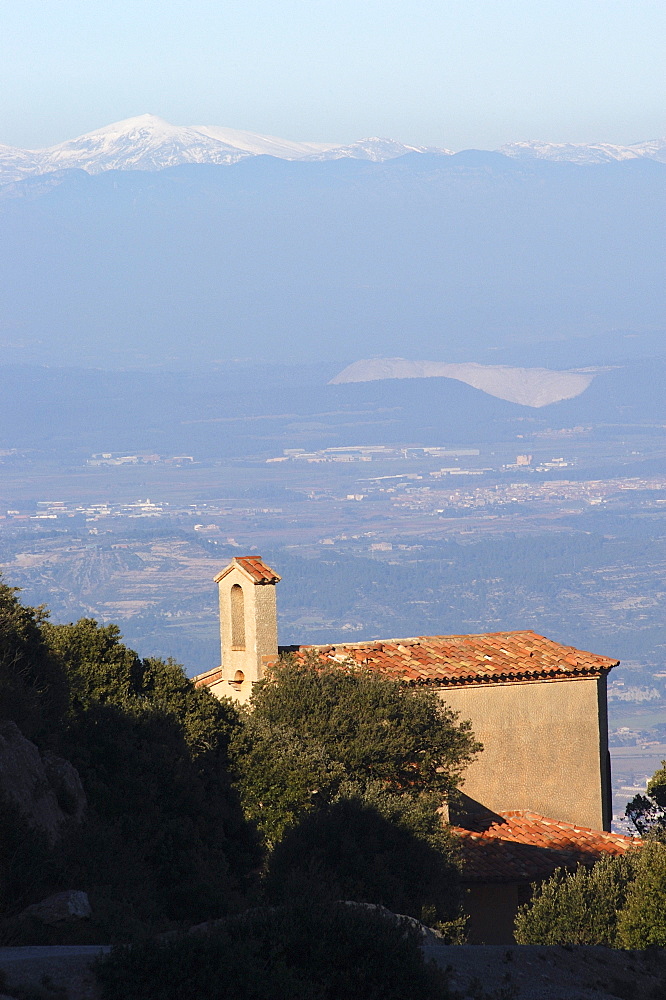 View of monastery and Pyrenees, Montserrat, Catalonia, Spain, Europe