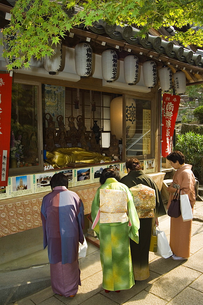 Women dressed in kimono for tea ceremony at temple, Miyajima island, Hiroshima prefecture, Japan, Asia