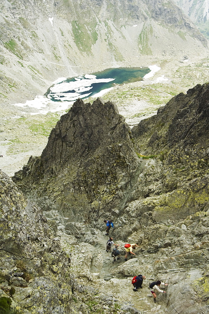 Hikers on trail, High Tatras Mountains (Vyoske Tatry), Tatra National Park, Slovakia, Europe