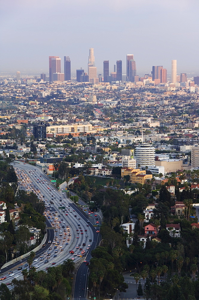 Downtown district skyscrapers and cars on a city highway, Los Angeles, California, United States of America, North America