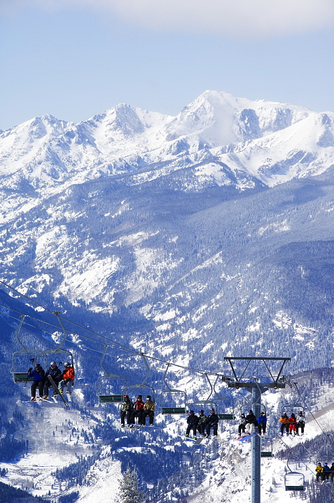 A chairlift taking skiers to the back bowls of Vail ski resort, Vail, Colorado, United States of America, North America