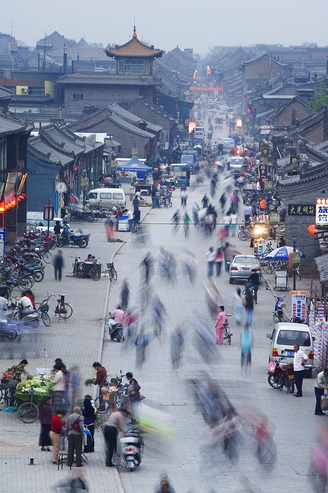 People in the historic old town, a UNESCO World Heritage Site, Pingyao City, Shanxi Province, China, Asia