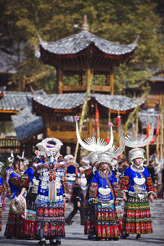 Elaborate costumes worn at a traditional Miao New Year festival in Xijiang, Guizhou Province, China, Asia