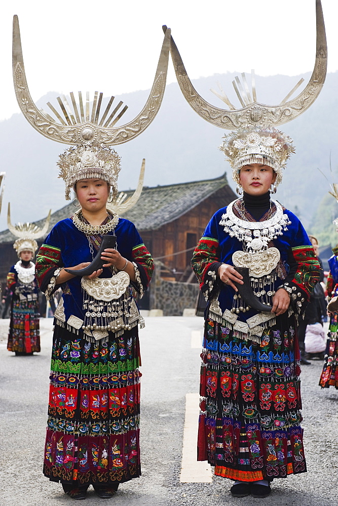 Elaborate costumes worn at a traditional Miao New Year festival in Xijiang, Guizhou Province, China, Asia