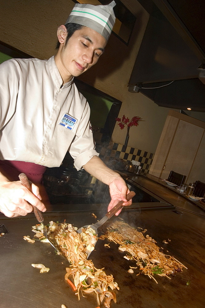 Okonomiyaki chef, restaurant, Hiroshima prefecture, Honshu, Japan, Asia