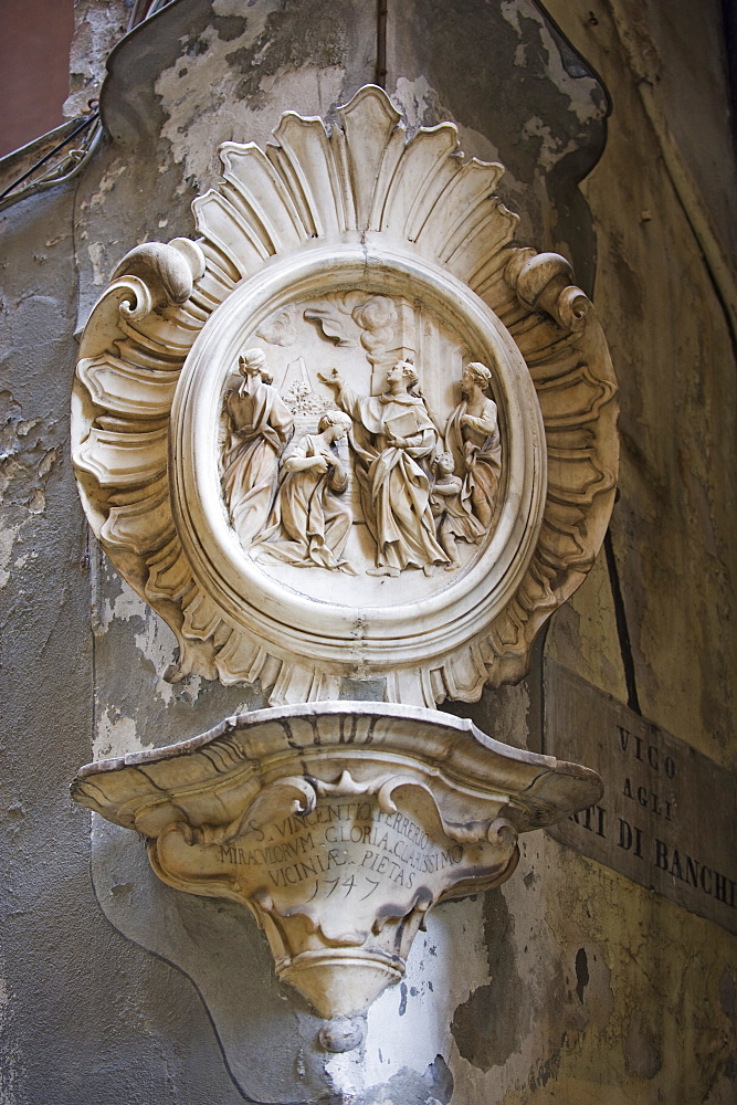 St. Vincent Ferrerio stone carving in the old town, UNESCO World Heritage Site, Genoa (Genova), Liguria, Italy, Europe