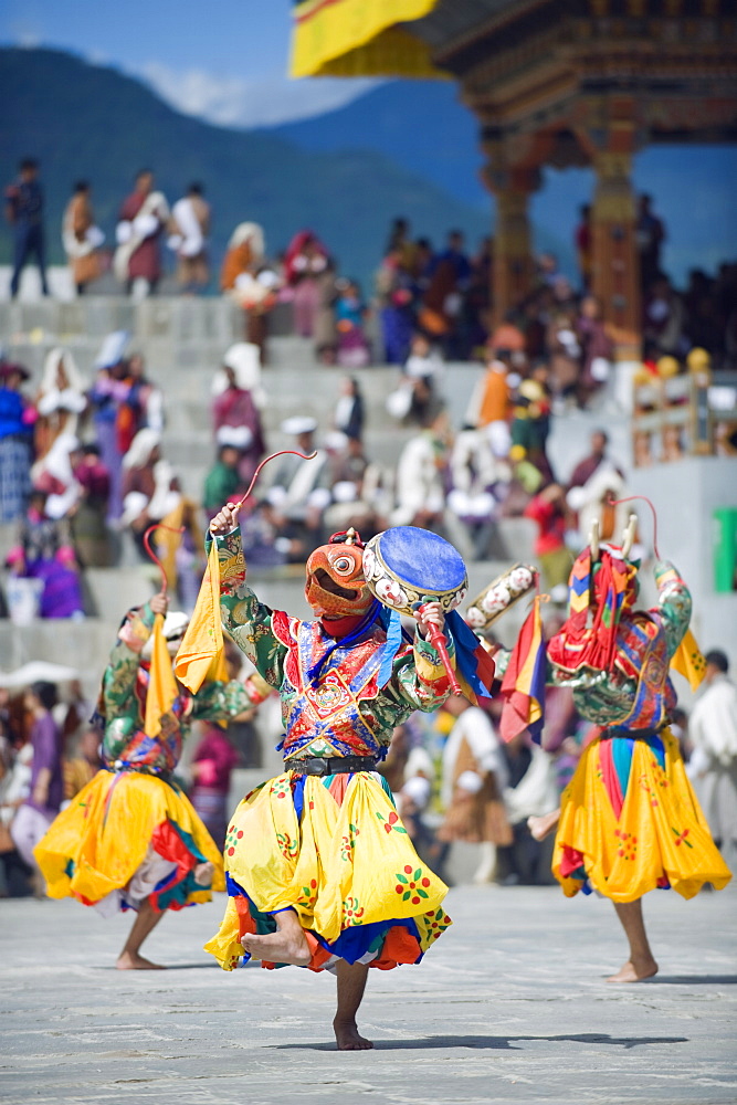 Dancers in traditional costume, Autumn Tsechu (festival) at Trashi Chhoe Dzong, Thimpu, Bhutan, Asia