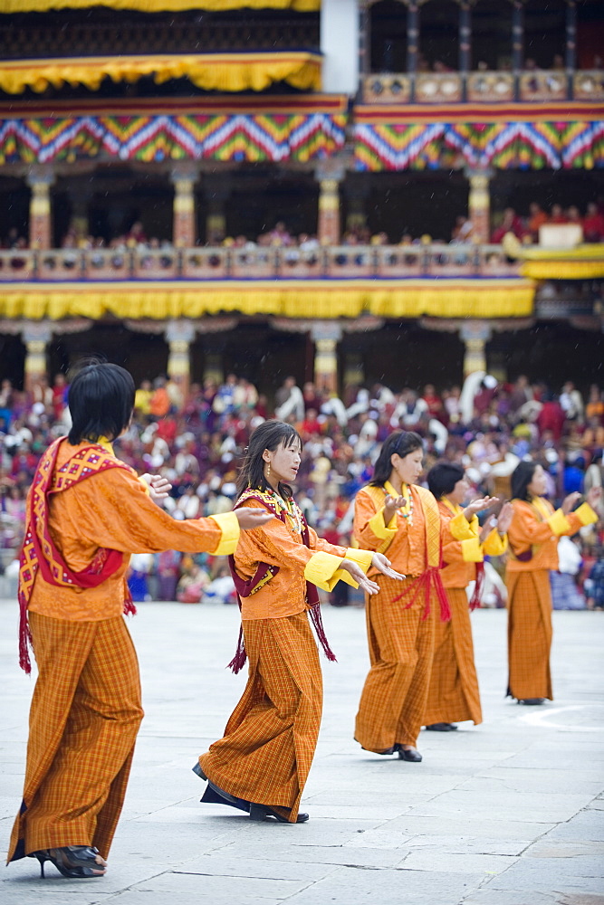 Dancers in traditional costume, Autumn Tsechu (festival) at Trashi Chhoe Dzong, Thimpu, Bhutan, Asia