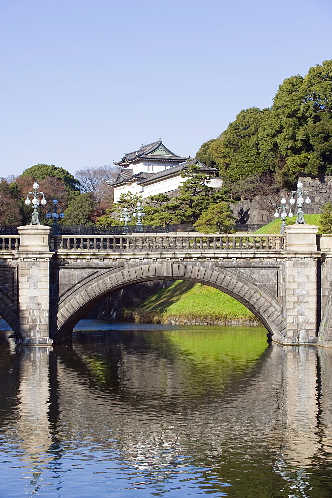 Niju Bashi bridge reflecting in moat, Imperial Palace, Tokyo, Japan, Asia