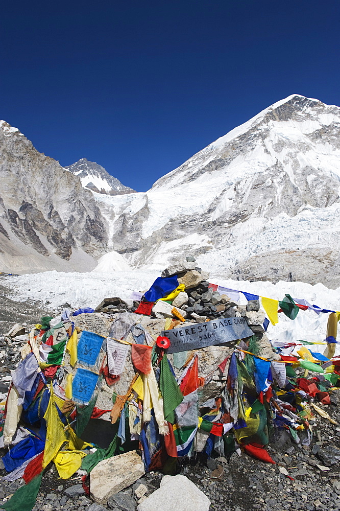 Prayer flags at the Everest Base Camp sign, Solu Khumbu Everest Region, Sagarmatha National Park, Himalayas, Nepal, Asia