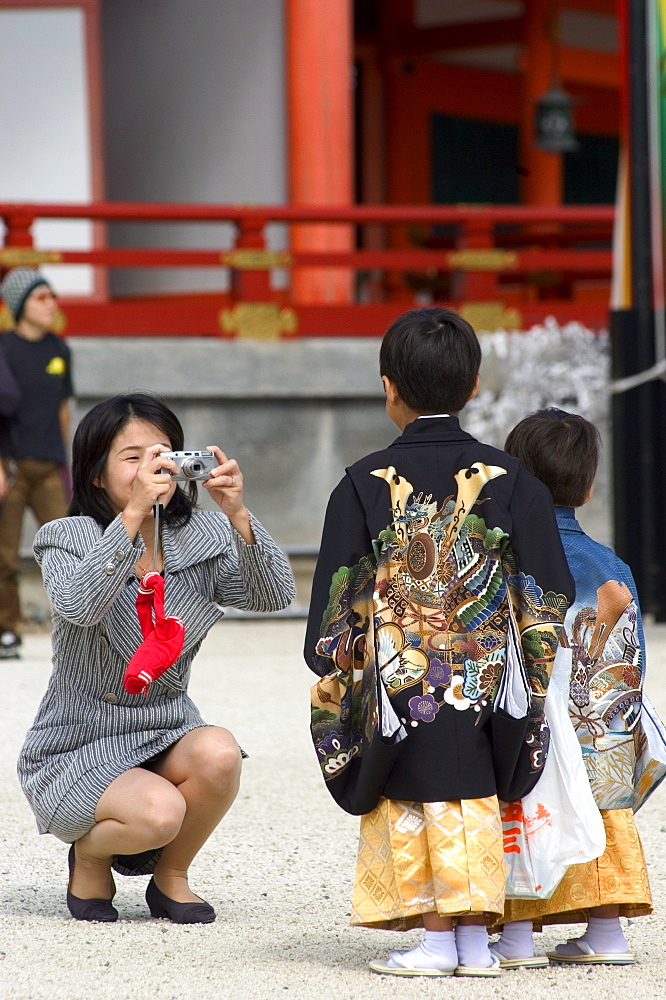 7-5-3 festival, mother and boys at at Heian jingu shrine, Kyoto city, Honshu, Japan, Asia