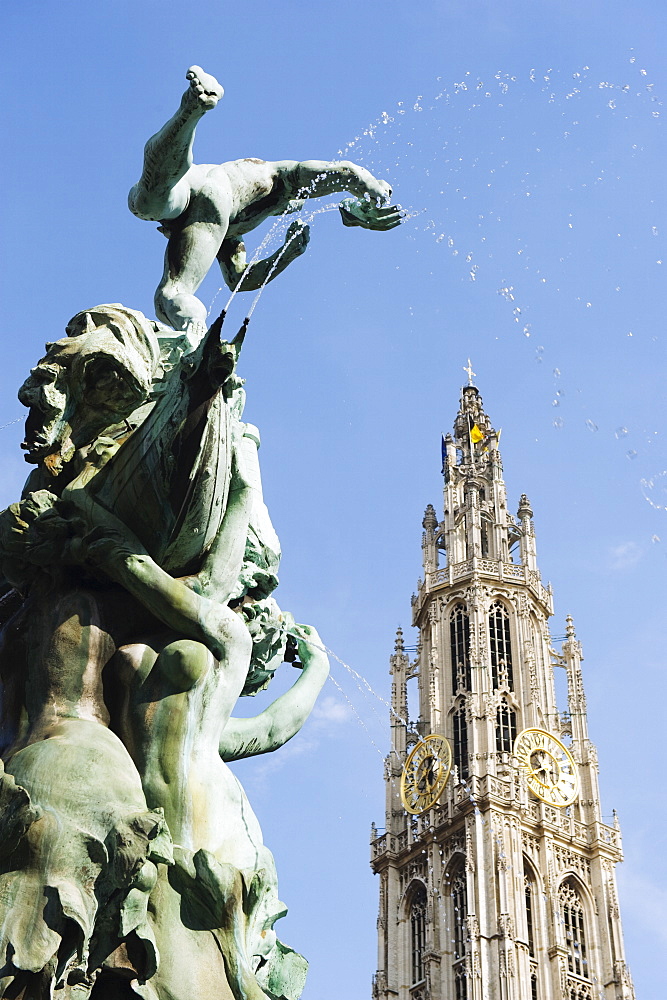 Tower of Onze Lieve Vrouwekathedraal and the baroque Brabo fountain, Grote Markt, Antwerp, Flanders, Belgium, Europe