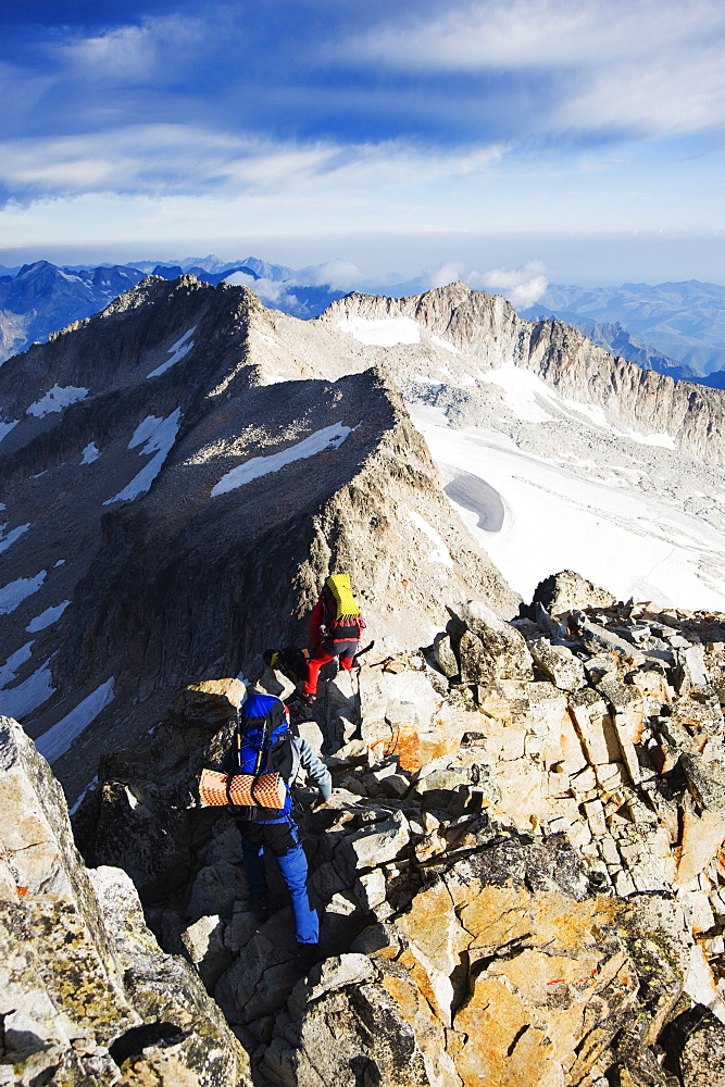 Climbers on summit of Pico de Aneto, at 3404m the highest peak in the Pyrenees, Spain, Europe