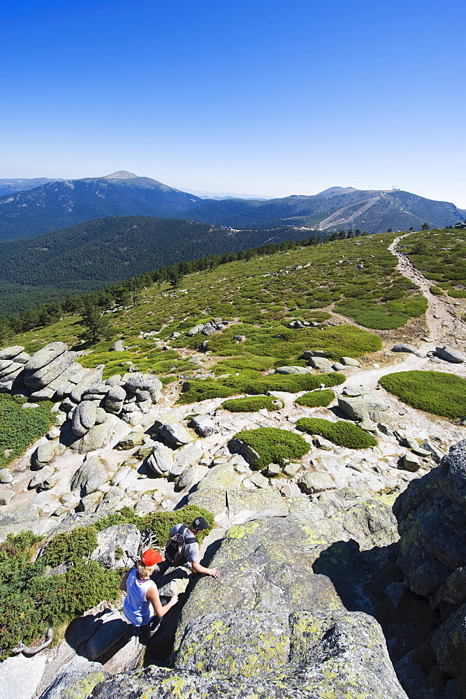 Hikers at Sietos Picos (Seven Peaks), in Guadarrama, Madrid, Spain, Europe