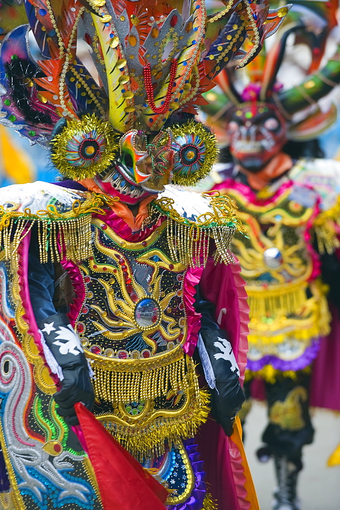 Masked performers in a parade at Oruro Carnival, Oruro, Bolivia, South America