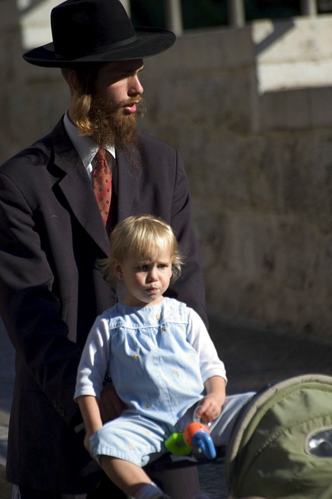 Jewish man in traditional clothes with child, Old Walled City, Jerusalem, Israel, Middle East