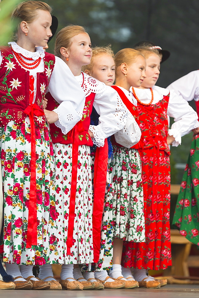 Performers in traditional costume, International Festival of Mountain Folklore, Zakopane, Carpathian Mountains, Poland, Europe