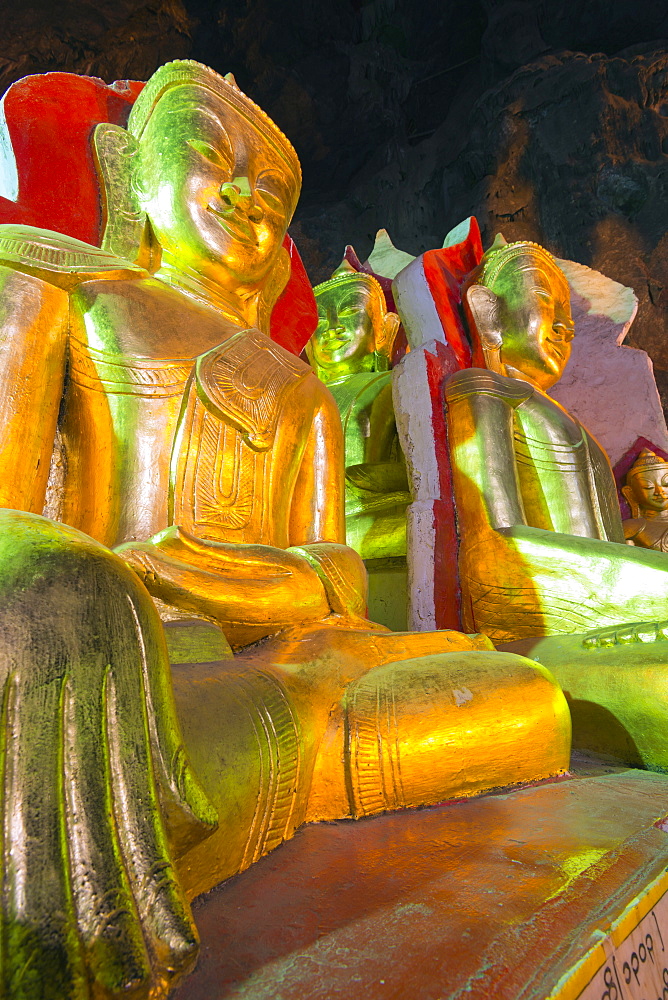 Buddha statues in entrance to Shwe Oo Min Natural Cave Pagoda, Pindaya, Myanmar (Burma), Asia