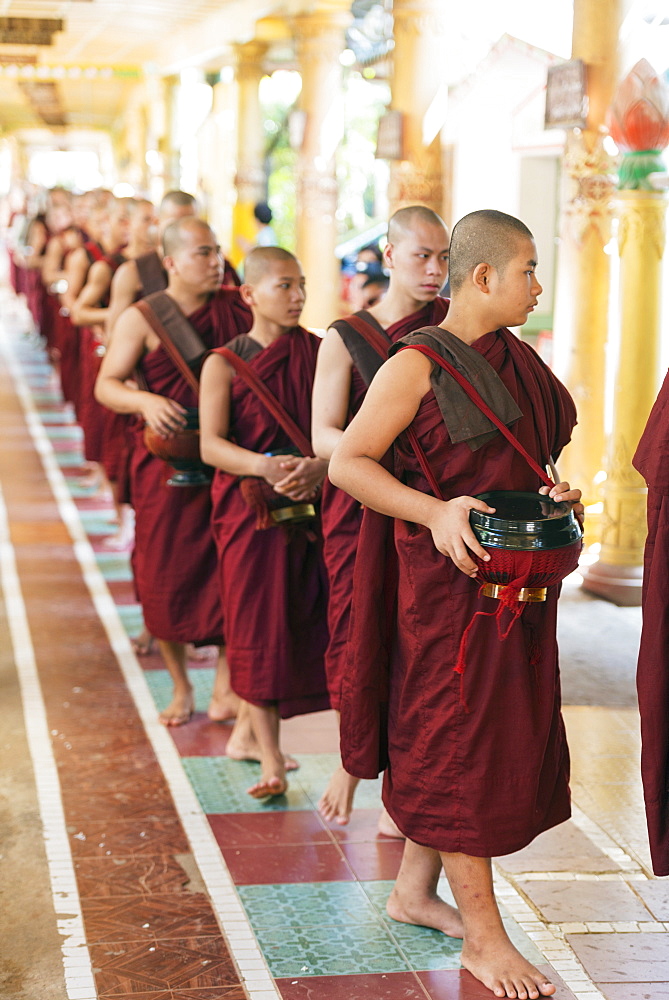 Meal time at Kha Khat Wain Kyaung monastery, Bago, Myanmar (Burma), Asia