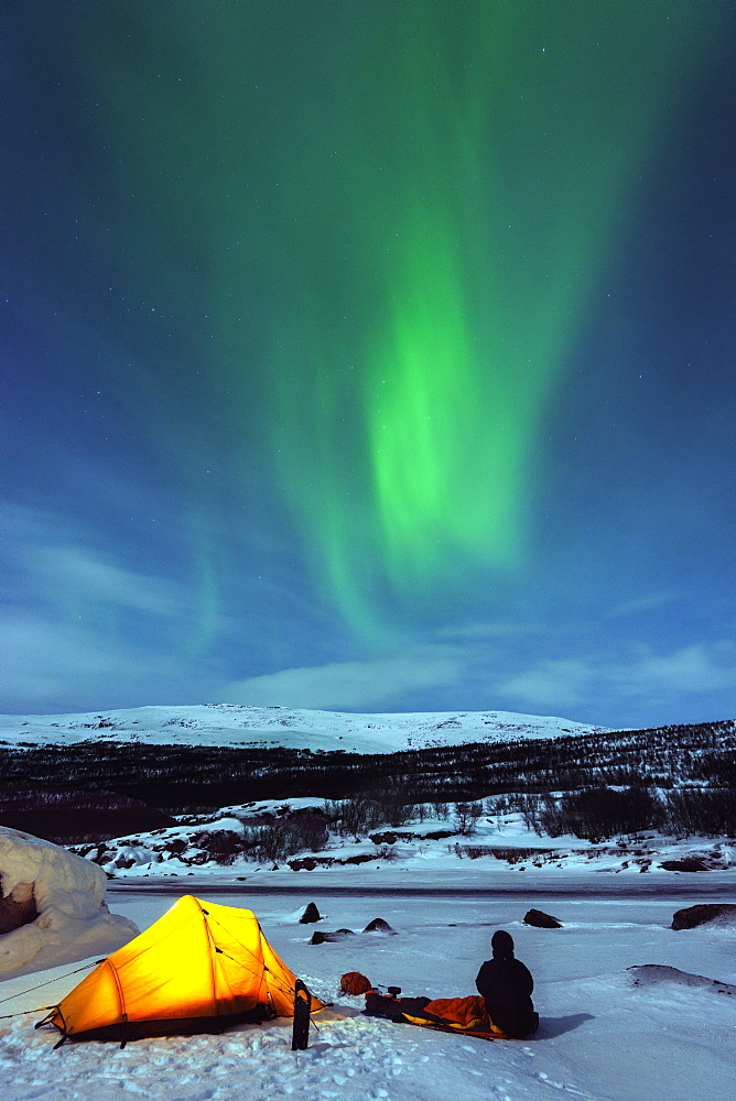 Aurora borealis (Northern lights) and winter camping on Kungsleden (The Kings Trail) hiking trail, Abisko National Park, Sweden, Scandinavia, Europe