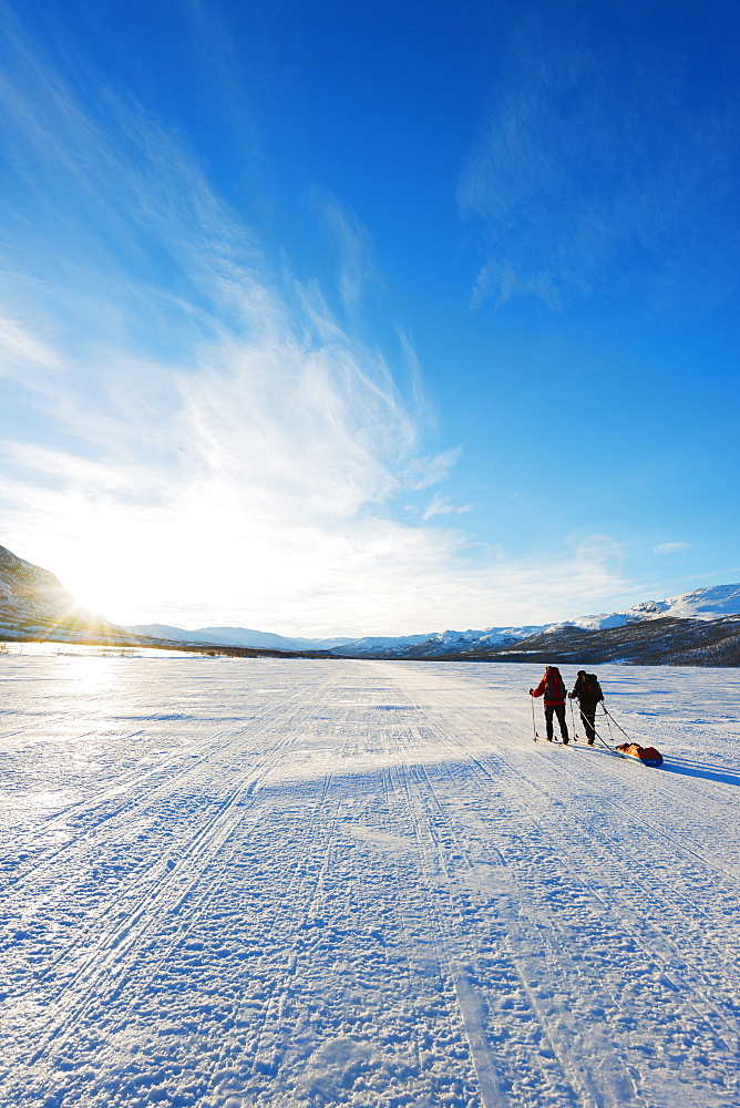 Ski touring on Kungsleden (The Kings Trail) frozen lake, Abisko National Park, Sweden, Scandinavia, Europe