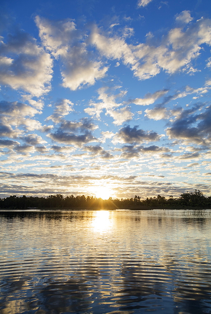 Clouds at sunset, Pangalanes Lakes canal system, Tamatave, Madagascar, Africa