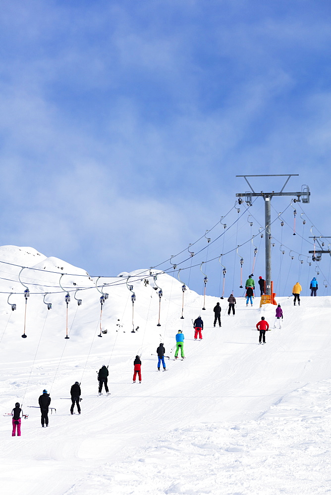 Skiers on a drag lift, Veysonnaz (Verbier), 4 Vallees, Valais, Swiss Alps, Switzerland, Europe