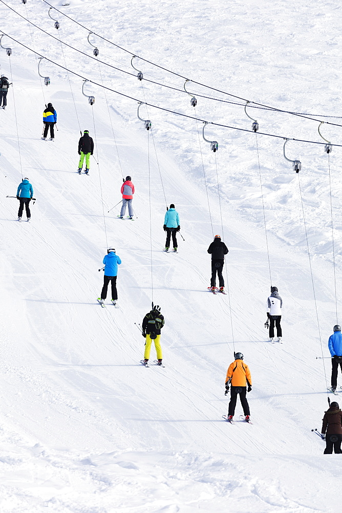 Skiers on a drag lift, Veysonnaz (Verbier), 4 Vallees, Valais, Swiss Alps, Switzerland, Europe